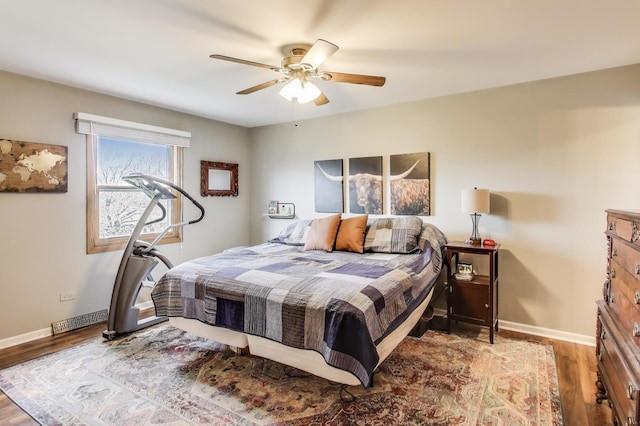 367 Quist Ct, Grayslake, IL 60030 - bedroom featuring wood finished floors, visible vents, baseboards, and ceiling fan