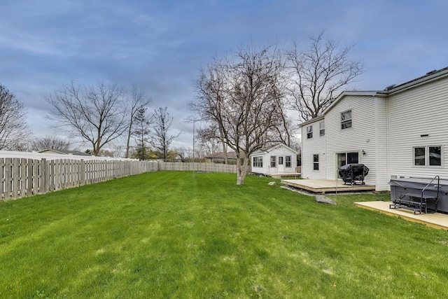 367 Quist Ct, Grayslake, IL 60030 - view of yard with a wooden deck, a fenced backyard, and a hot tub