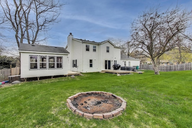 367 Quist Ct, Grayslake, IL 60030 - rear view of property featuring a lawn, fence, and a deck