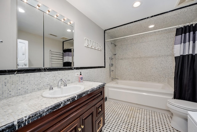 bathroom featuring vanity, recessed lighting, toilet, visible vents, and shower / bath combo