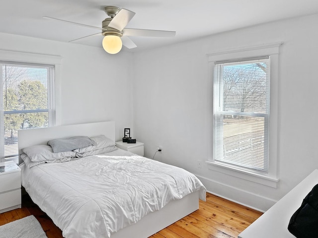 17128 Lukens Rd, Sycamore, IL 60178 - bedroom with light wood-type flooring and ceiling fan