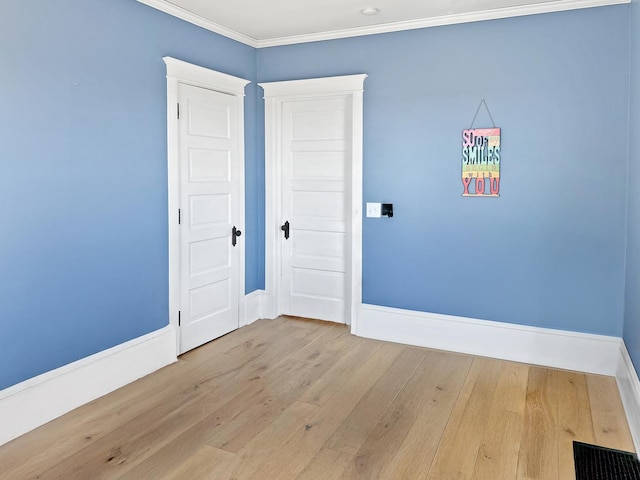 17128 Lukens Rd, Sycamore, IL 60178 - empty room with wood finished floors, baseboards, and ornamental molding
