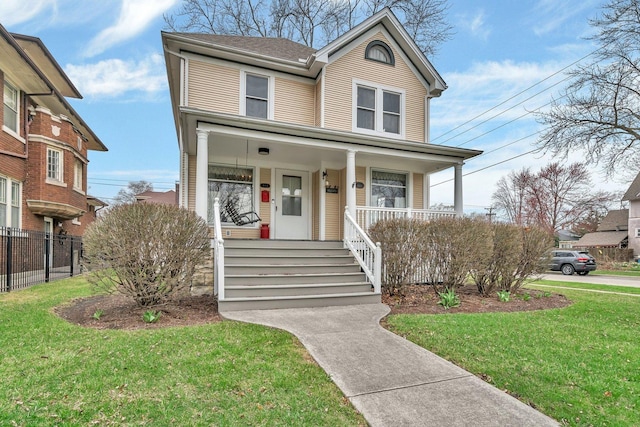 313 N Raynor Ave, Joliet, IL 60435 - view of front facade with a porch
