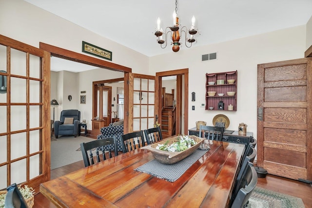 313 N Raynor Ave, Joliet, IL 60435 - dining room with a chandelier and wood finished floors