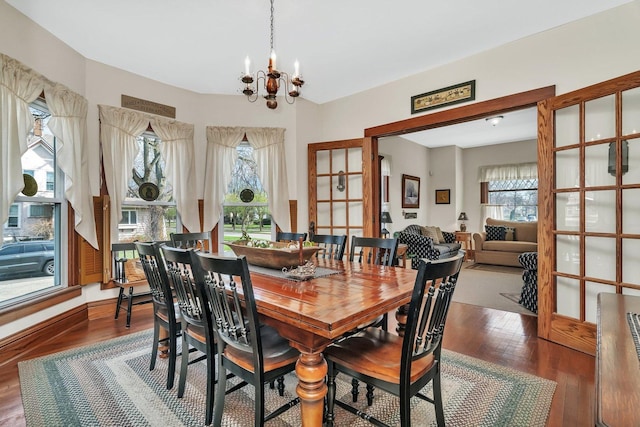 313 N Raynor Ave, Joliet, IL 60435 - dining space with a chandelier and wood finished floors