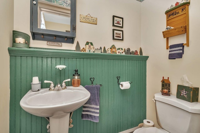 313 N Raynor Ave, Joliet, IL 60435 - half bathroom featuring toilet and a sink