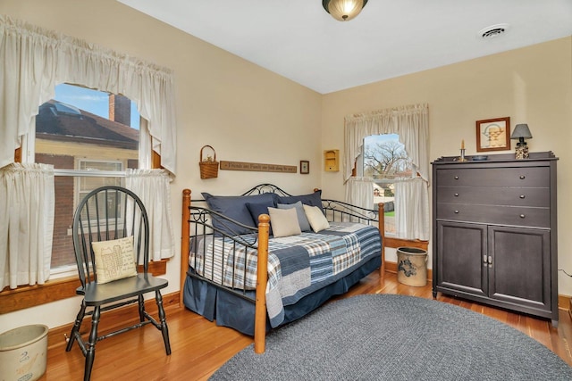 313 N Raynor Ave, Joliet, IL 60435 - bedroom with wood finished floors and baseboards