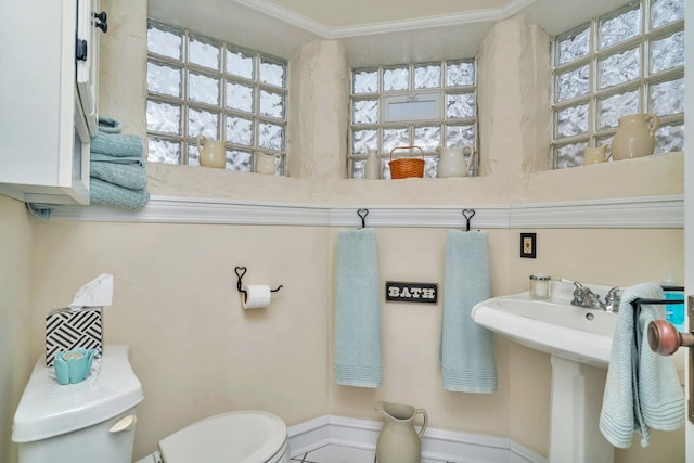 313 N Raynor Ave, Joliet, IL 60435 - half bathroom with toilet and ornamental molding