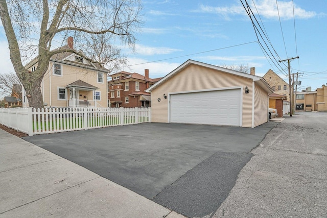313 N Raynor Ave, Joliet, IL 60435 - view of front of house featuring a garage and a residential view