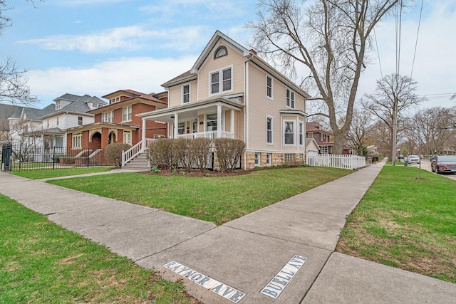 313 N Raynor Ave, Joliet, IL 60435 - view of front of home with a porch and a residential view