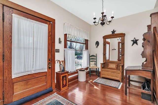 313 N Raynor Ave, Joliet, IL 60435 - foyer entrance featuring a chandelier and wood finished floors
