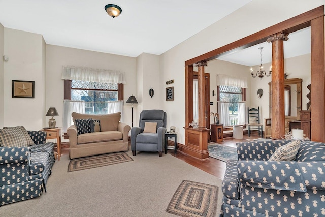 313 N Raynor Ave, Joliet, IL 60435 - living room featuring ornate columns and a chandelier