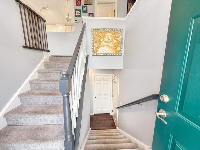 648 S Rosehall Ln, Round Lake, IL 60073 - staircase featuring baseboards