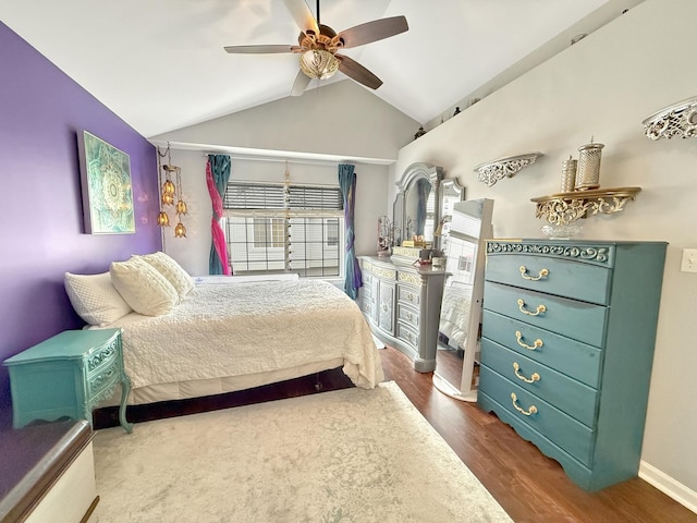 648 S Rosehall Ln, Round Lake, IL 60073 - bedroom with wood finished floors, baseboards, ceiling fan, and lofted ceiling