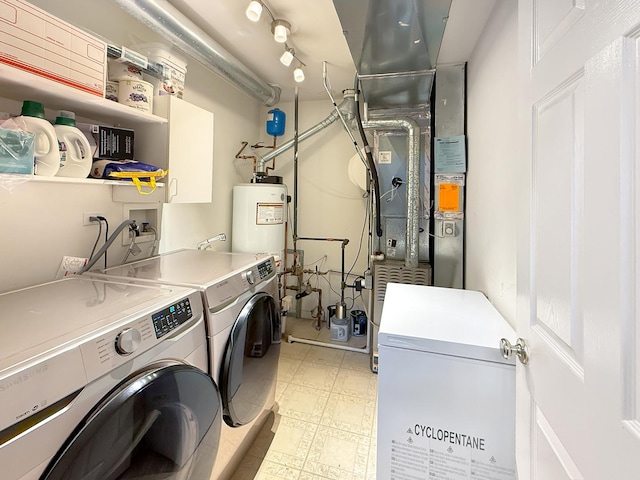 648 S Rosehall Ln, Round Lake, IL 60073 - laundry room featuring laundry area, heating unit, light floors, and washing machine and dryer