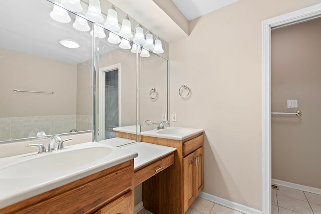 full bathroom featuring tile patterned floors, a sink, and two vanities