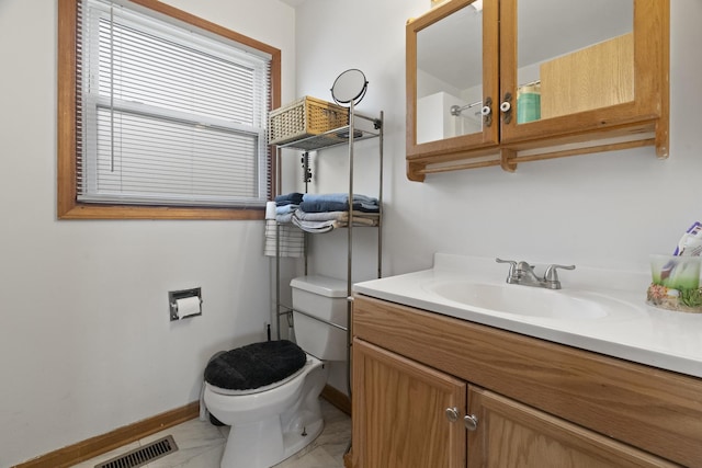 37115 N Sistina Ave, Lake Villa, IL 60046 - bathroom with baseboards, visible vents, toilet, and vanity