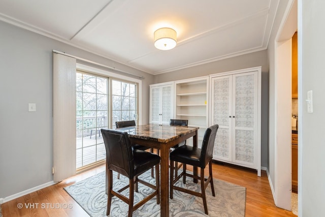 264 Evergreen Ln, Bloomingdale, IL 60108 - dining space with light wood-type flooring, baseboards, and crown molding