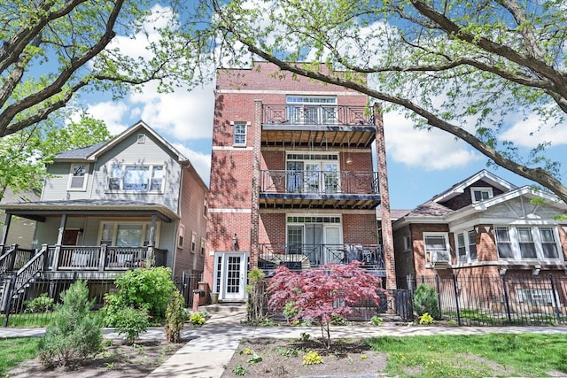4310 N Richmond St Unit 1, Chicago, IL 60618 - view of front of house with brick siding and fence