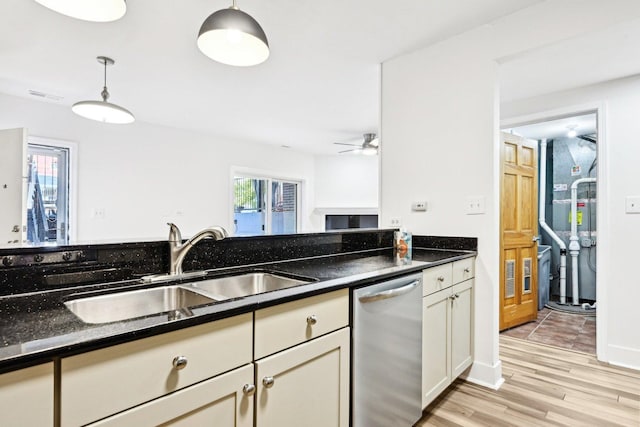 4310 N Richmond St Unit 1, Chicago, IL 60618 - kitchen with stainless steel dishwasher, a sink, pendant lighting, light wood-style floors, and a ceiling fan