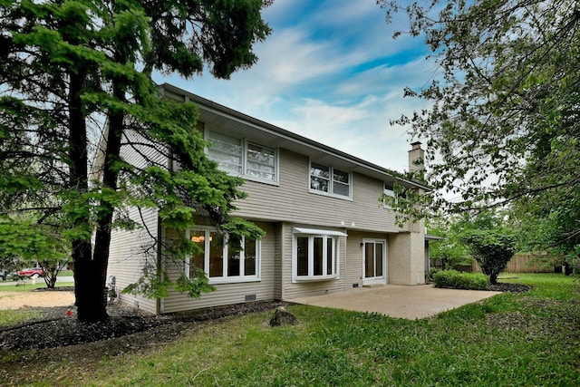 6S210 Mariwood Ct, Naperville, IL 60540 - back of property with a chimney, a patio area, and a yard