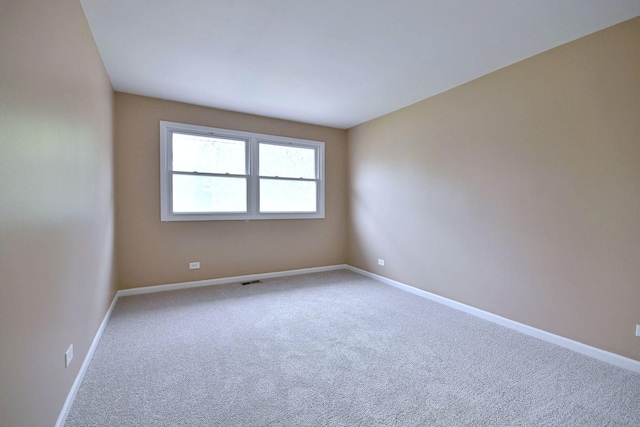6S210 Mariwood Ct, Naperville, IL 60540 - empty room featuring carpet floors and baseboards