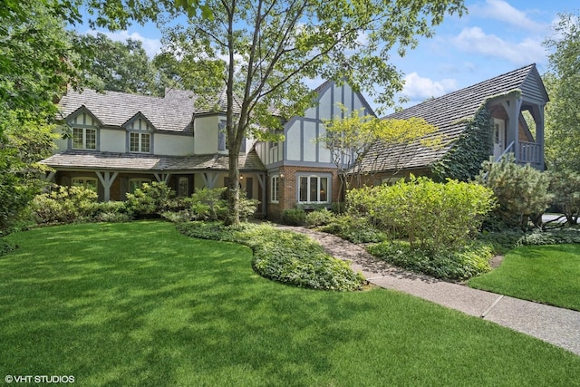 1214 Turicum Rd, Lake Forest, IL 60045 - tudor house featuring a front lawn and stucco siding