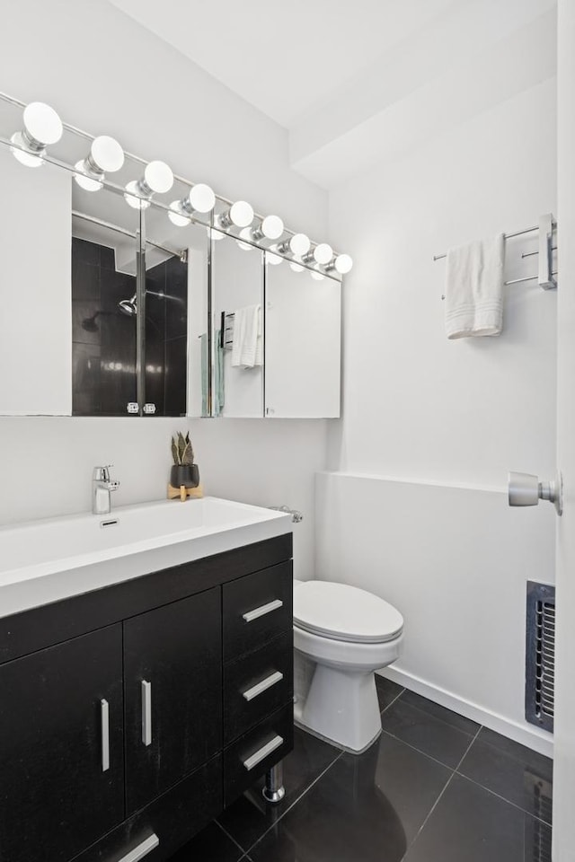 bathroom with tile patterned floors, visible vents, toilet, vanity, and walk in shower