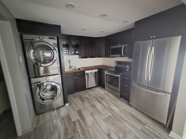 324 Klein Creek Ct Unit A, Carol Stream, IL 60188 - laundry area featuring estacked washer and dryer and wood tiled floors