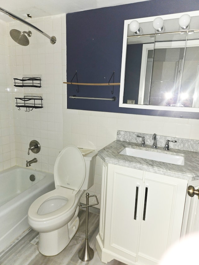 324 Klein Creek Ct Unit A, Carol Stream, IL 60188 - bathroom featuring shower / bathtub combination, vanity, toilet, and tile walls