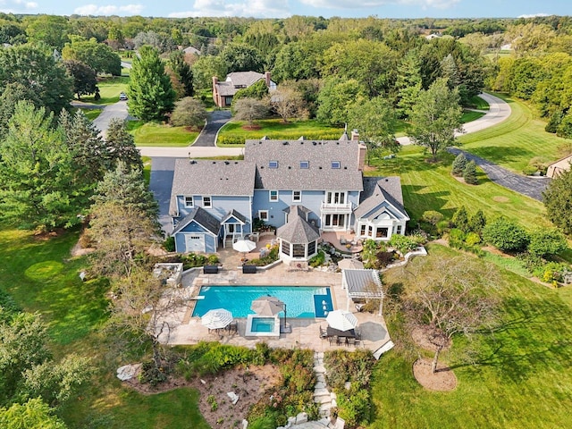 bird's eye view with a view of trees
