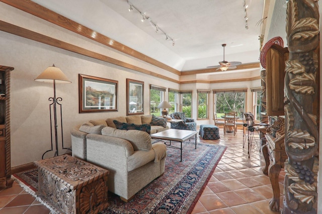 living area featuring tile patterned floors and ceiling fan