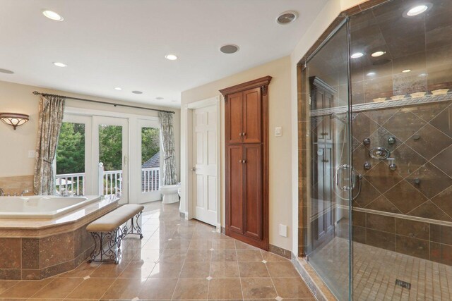full bathroom with a bath, recessed lighting, tile patterned flooring, and a shower stall