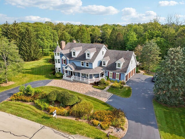 bird's eye view with a view of trees