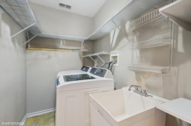 4134 S Ellis Ave, Chicago, IL 60653 - washroom with washing machine and clothes dryer and baseboards