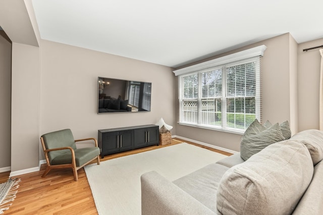 405 Ashbury Ln, Lemont, IL 60439 - living room with baseboards and light wood-style flooring