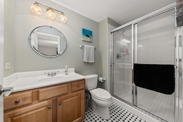 405 Ashbury Ln, Lemont, IL 60439 - bathroom featuring toilet, a shower stall, and vanity