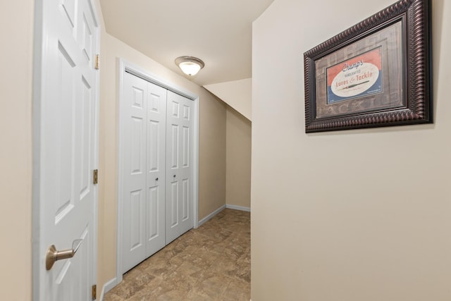 405 Ashbury Ln, Lemont, IL 60439 - hall with baseboards and stone finish flooring