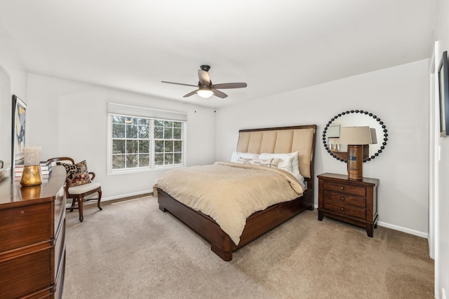 405 Ashbury Ln, Lemont, IL 60439 - bedroom with light colored carpet, baseboards, and ceiling fan