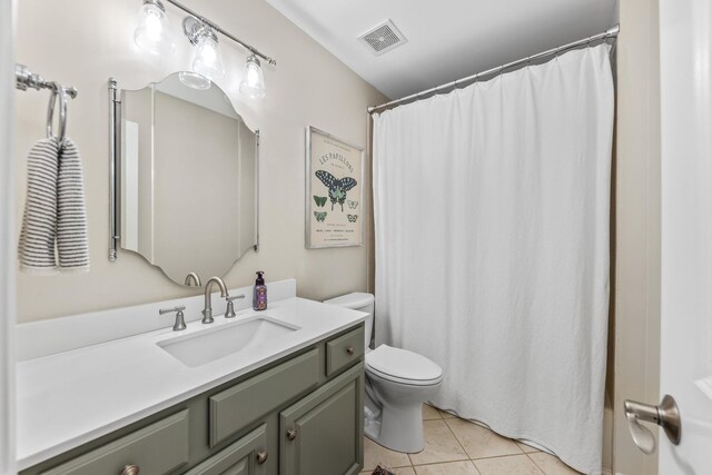 405 Ashbury Ln, Lemont, IL 60439 - full bathroom with toilet, tile patterned floors, and vanity