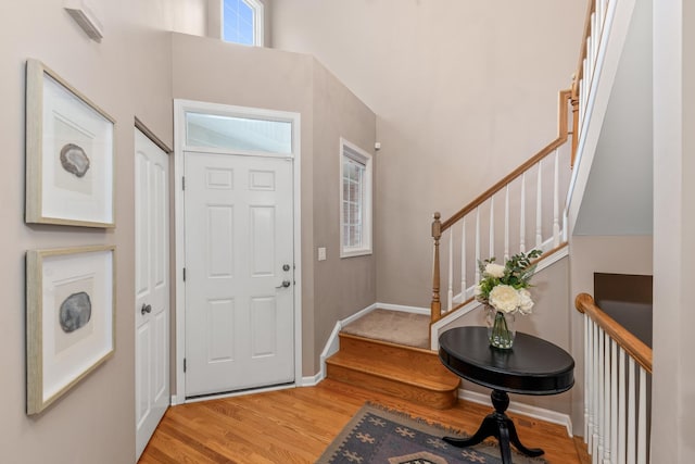 405 Ashbury Ln, Lemont, IL 60439 - foyer with wood finished floors, stairs, and baseboards