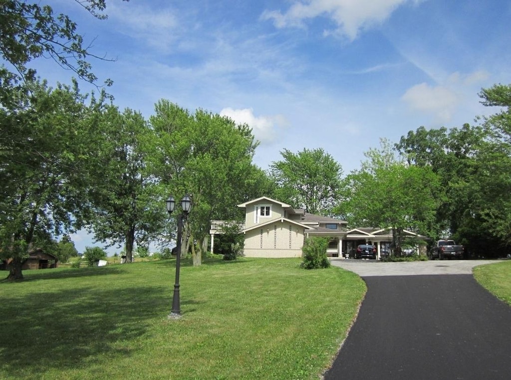 32053 S Klemme Rd, Beecher, IL 60401 - view of front of property with asphalt driveway and a front lawn