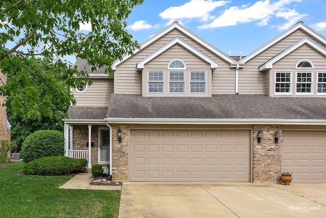 45 Exmoor Ave, Glen Ellyn, IL 60137 - multi unit property featuring brick siding, concrete driveway, roof with shingles, and an attached garage