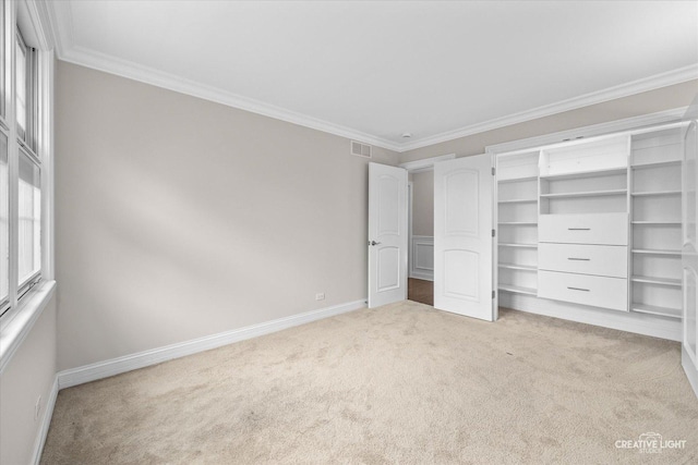 45 Exmoor Ave, Glen Ellyn, IL 60137 - unfurnished bedroom with carpet floors, ornamental molding, baseboards, and a closet