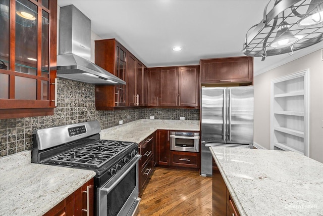 45 Exmoor Ave, Glen Ellyn, IL 60137 - kitchen featuring stainless steel appliances, wall chimney range hood, dark wood finished floors, light stone countertops, and ornamental molding