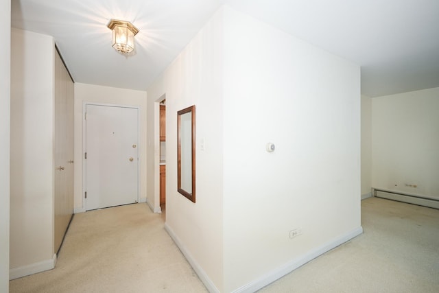 4248 Saratoga Ave Unit 308, Downers Grove, IL 60515 - hall with baseboards, a baseboard heating unit, and light carpet