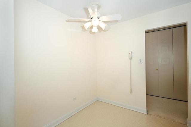 4248 Saratoga Ave Unit 308, Downers Grove, IL 60515 - spare room with baseboards and ceiling fan