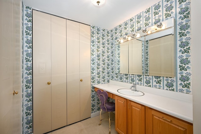 4248 Saratoga Ave Unit 308, Downers Grove, IL 60515 - bathroom featuring vanity and wallpapered walls