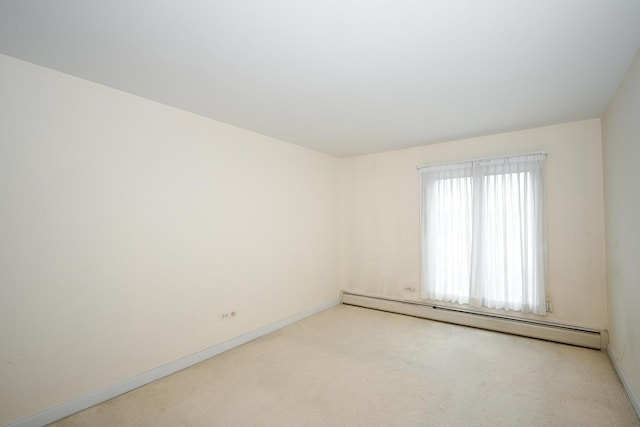 4248 Saratoga Ave Unit 308, Downers Grove, IL 60515 - carpeted empty room with a baseboard radiator and baseboards