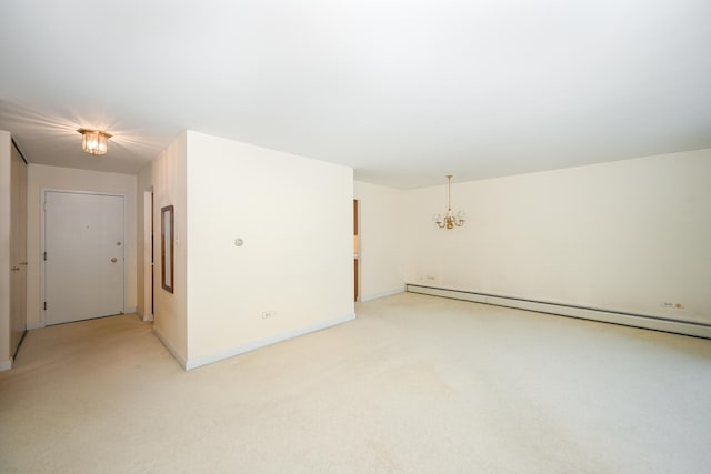 4248 Saratoga Ave Unit 308, Downers Grove, IL 60515 - spare room featuring baseboards, baseboard heating, light colored carpet, and an inviting chandelier